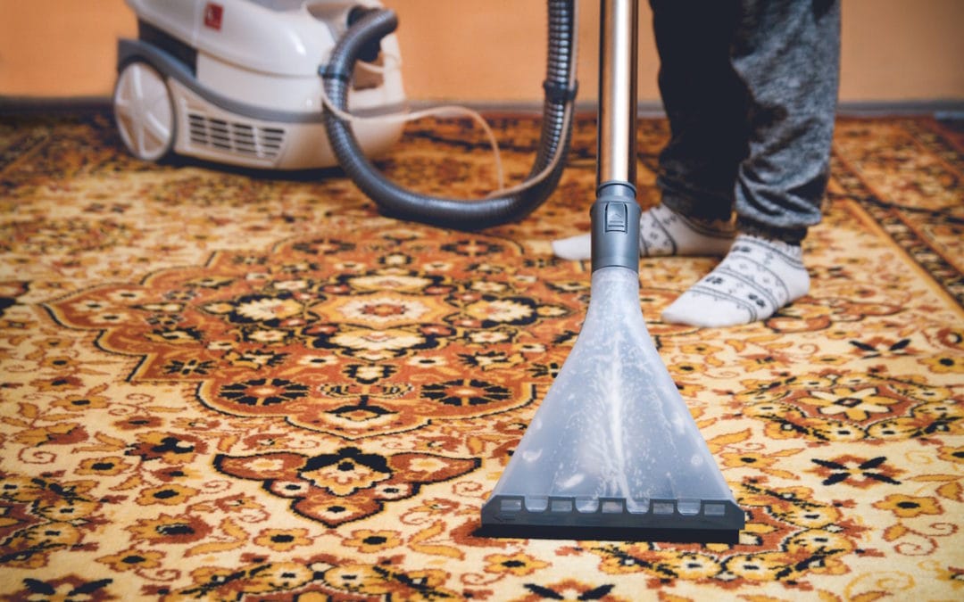 Extraction tool on an orange ornate Persian rug