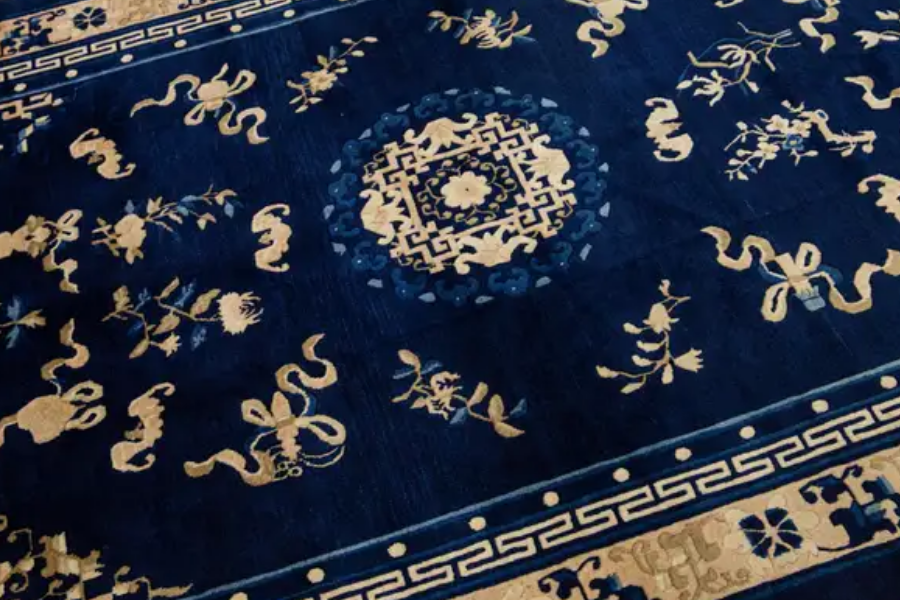 Navy Chinese rug with a gold roundel medallion