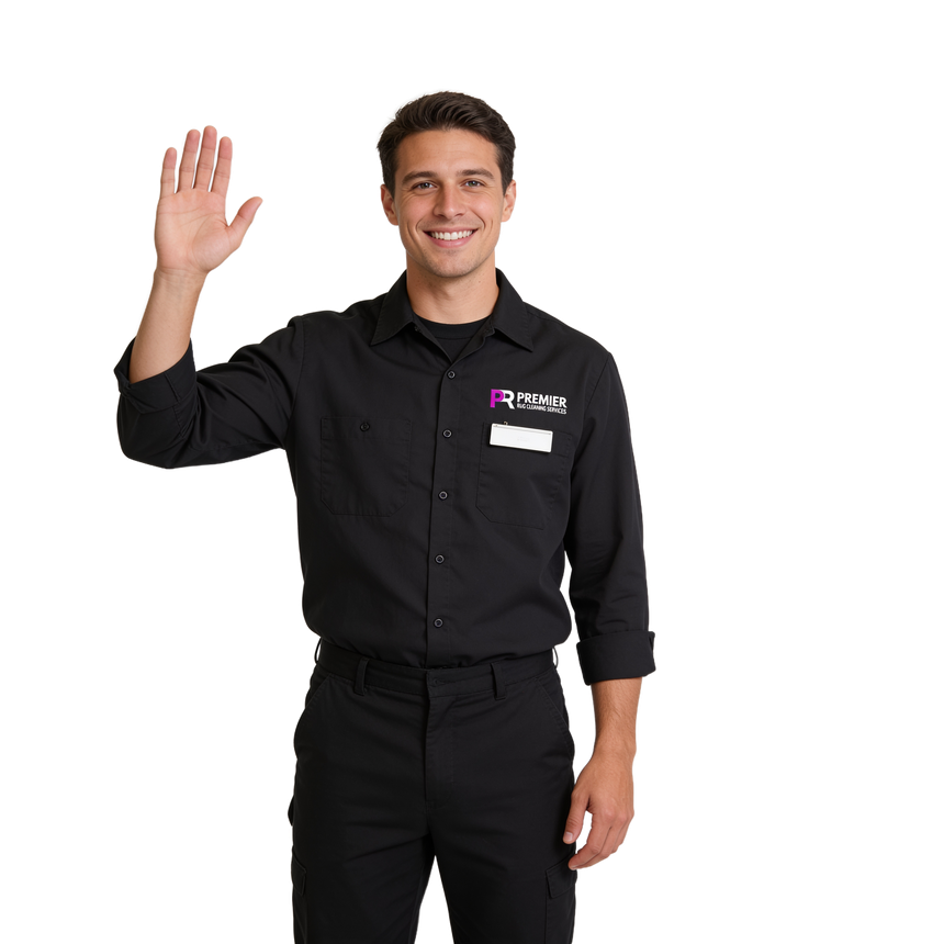 A friendly Premier Rug Cleaning technician in uniform