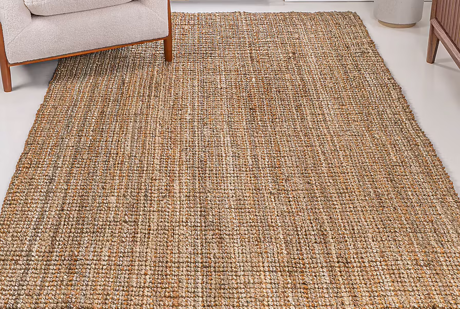 Tan coir woven rug in a modern living room
