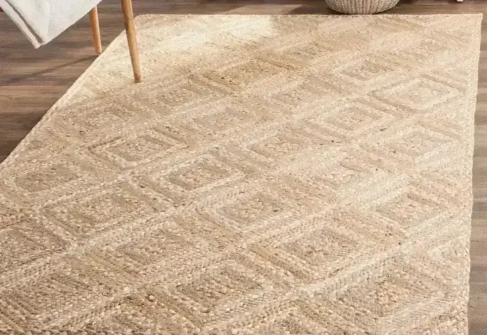 Tan handwoven rug with a diamond lattice pattern