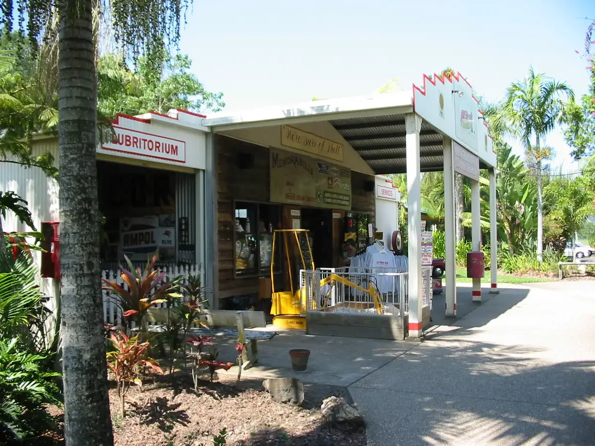 A restored vintage service station on display at the Ginger Factory