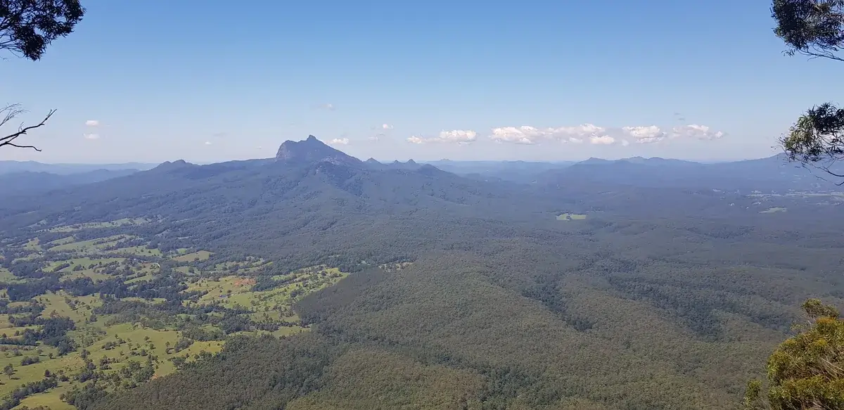 Wollumbin's peak rising above the ranges, seen from a distant lookout