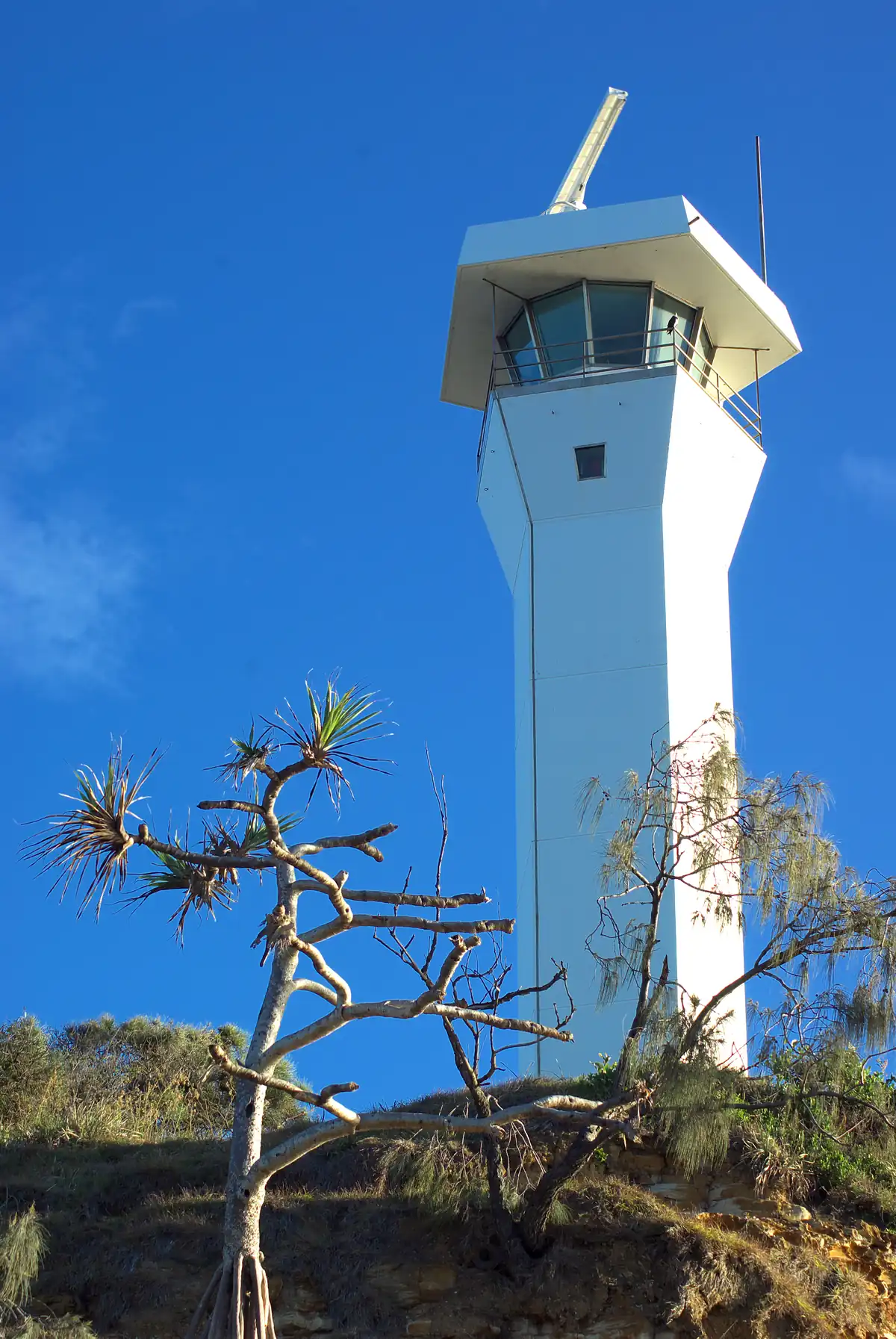 The Point Cartwright light tower in afternoon sun
