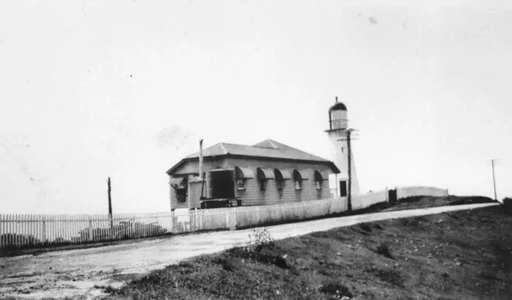 The old Caloundra lighthouse beside its keeper's cottage