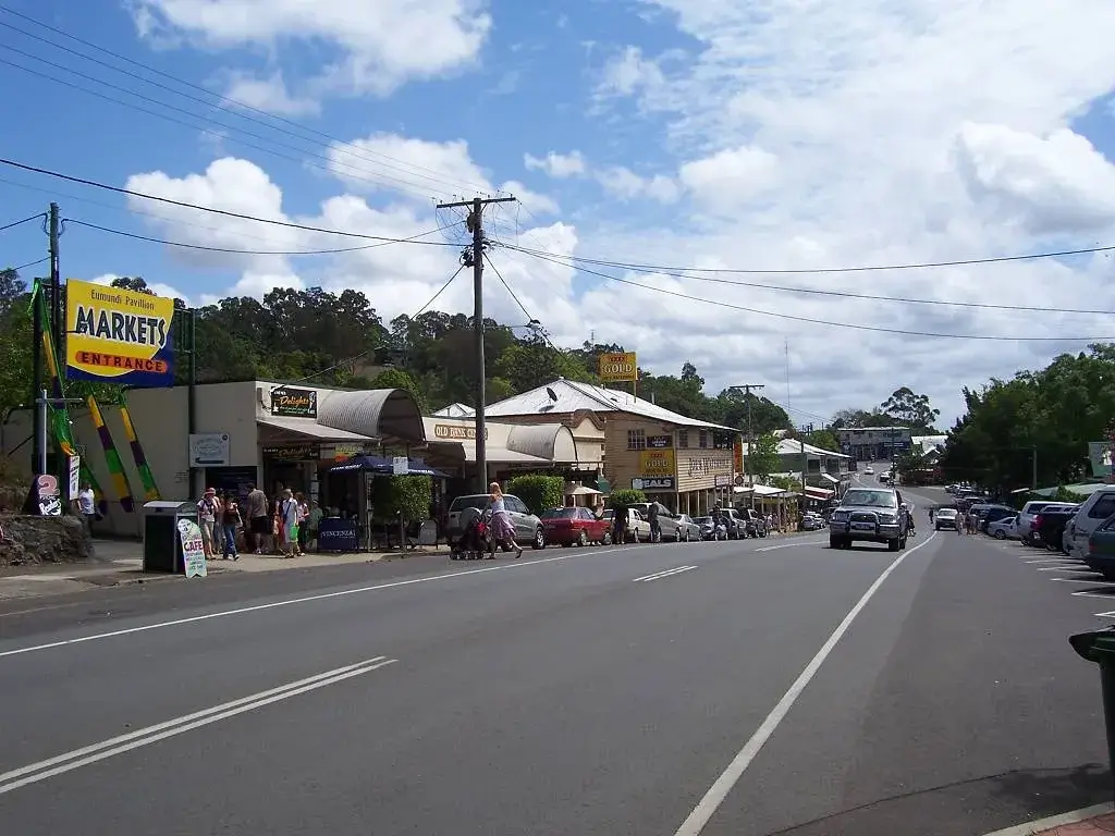 Eumundi's main street with the markets entrance sign on the left